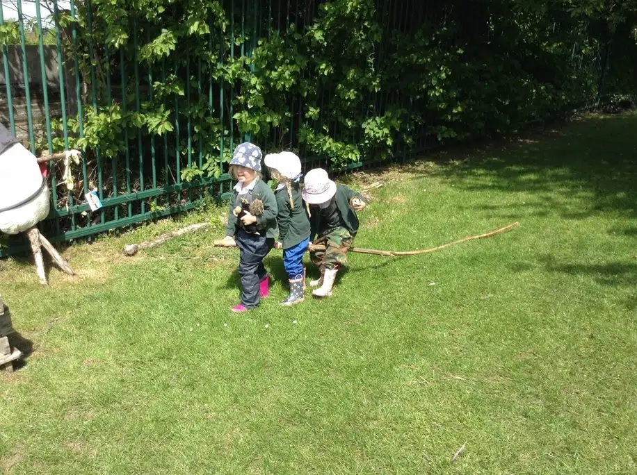 Using a long stick as an imaginary broomstick