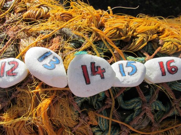 Number stones with teen numbers painted onto them