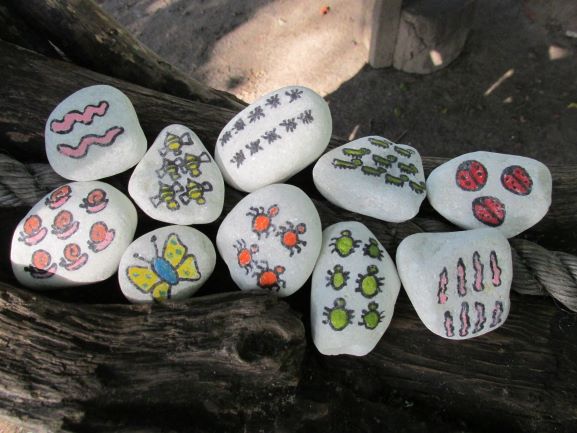 Painted number stones with bugs on them