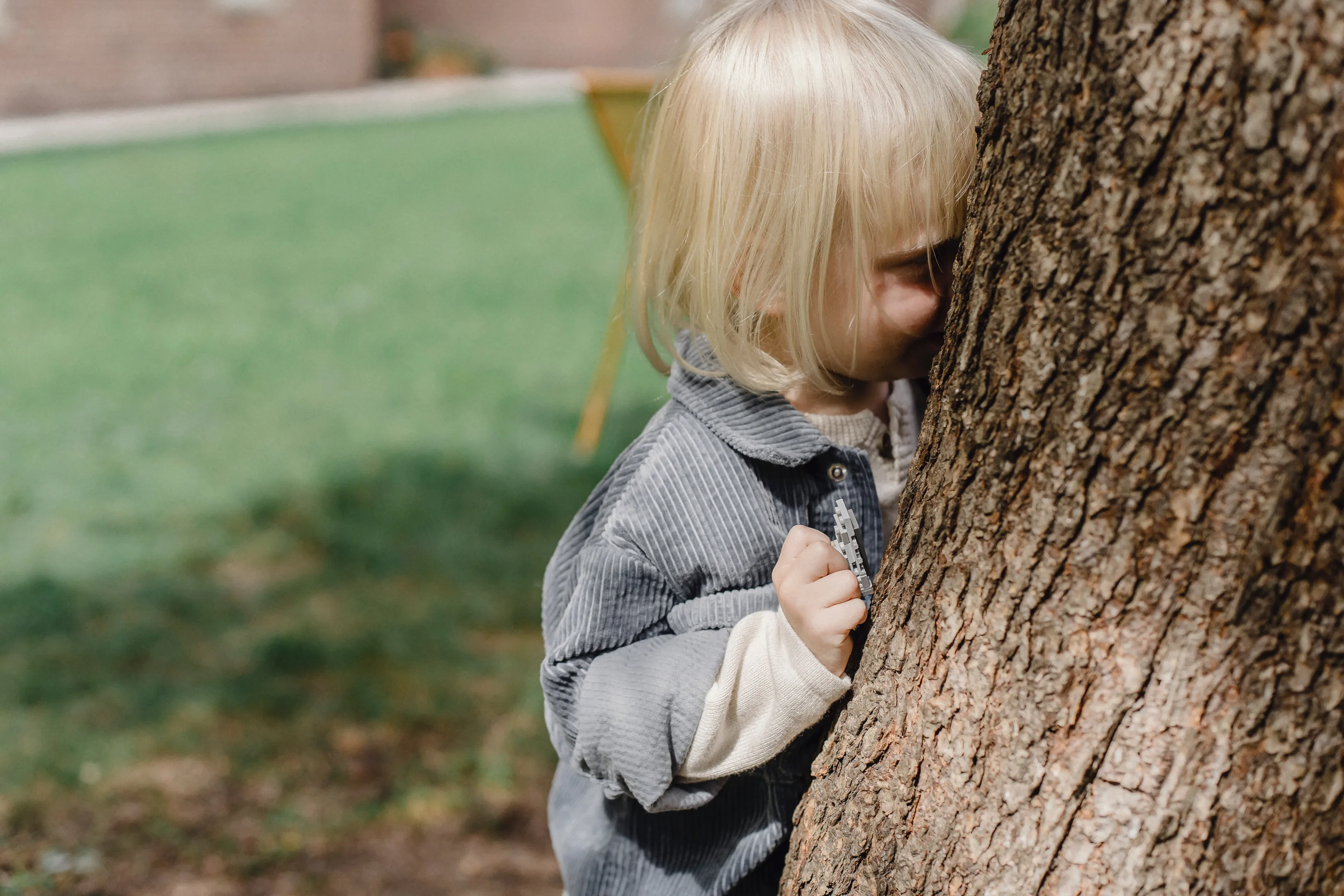 Kid playing hide and seek